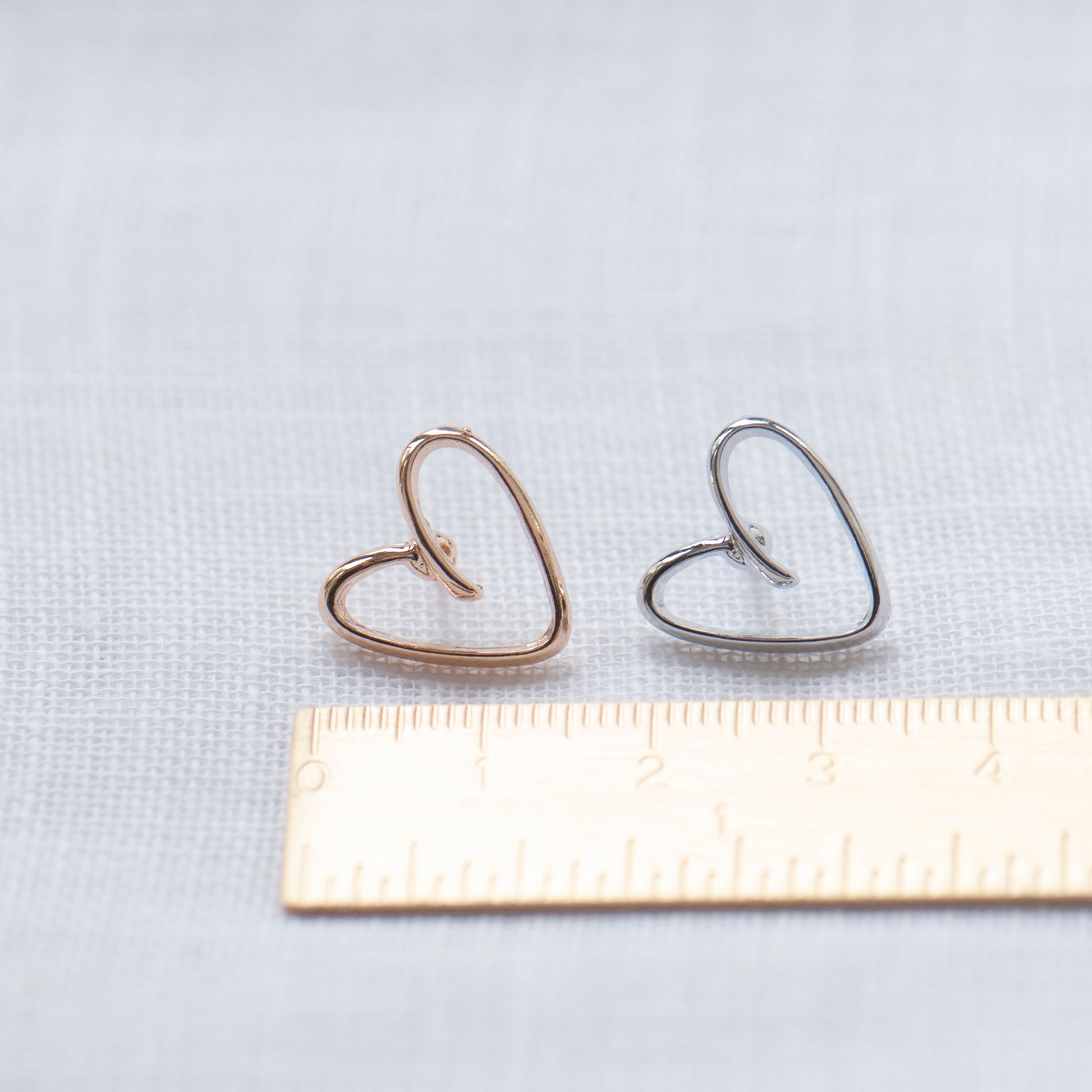 gold and silver heart modesty pins 