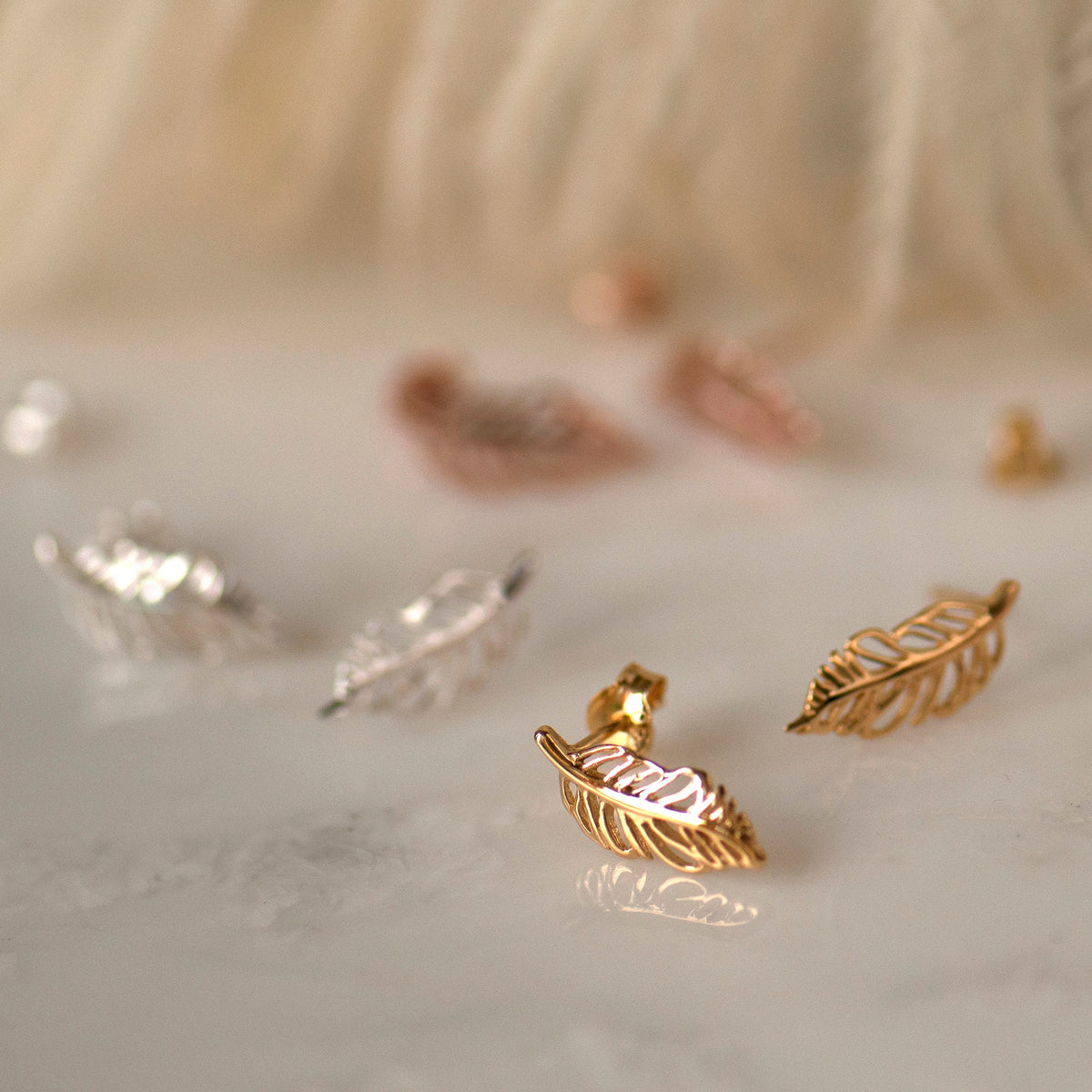 gold plated over sterling silver feather stud earrings