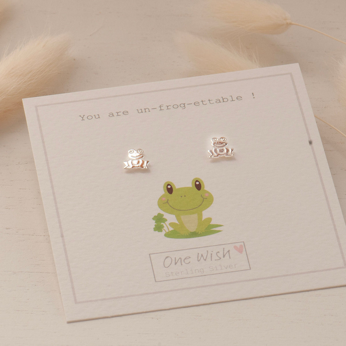 sterling silver frog stud earrings on unfrogettable gift card ready for gifting