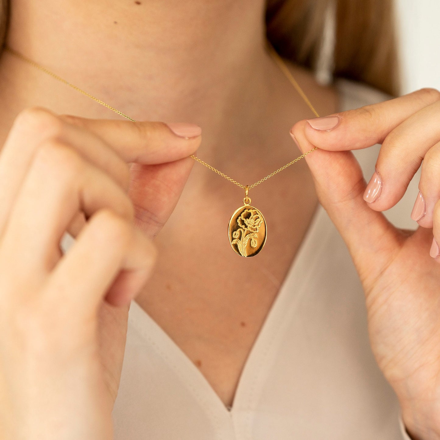 Gold plated sterling silver poppy necklace close up