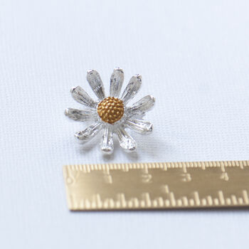 Tiny silver and gold daisy brooch