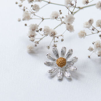 Tiny silver and gold daisy brooch