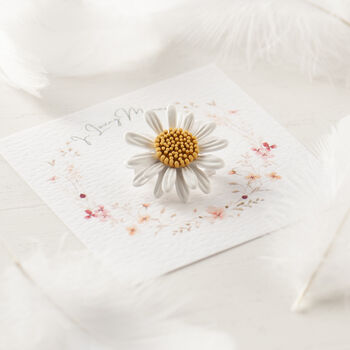 white daisy brooch on in loving memory gift card