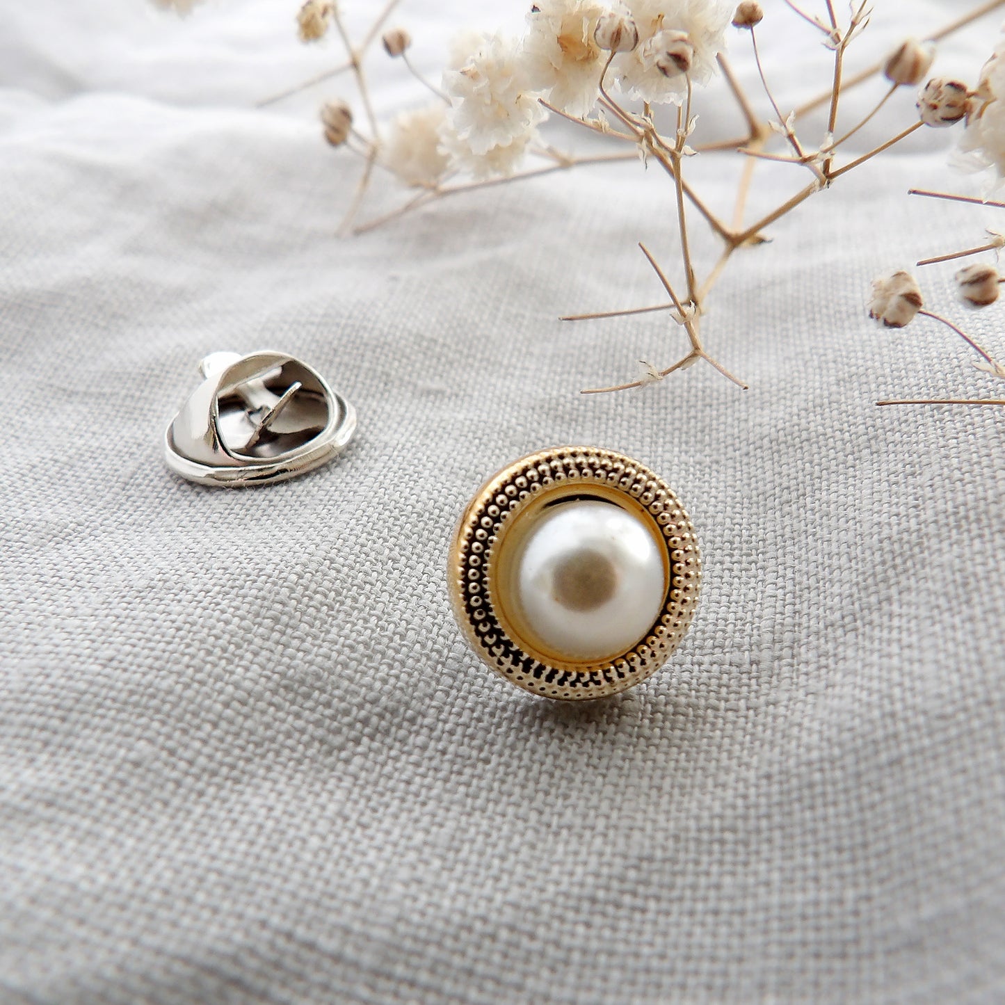 pearl and gold surround modesty pin close up deatil picture, extra button pin