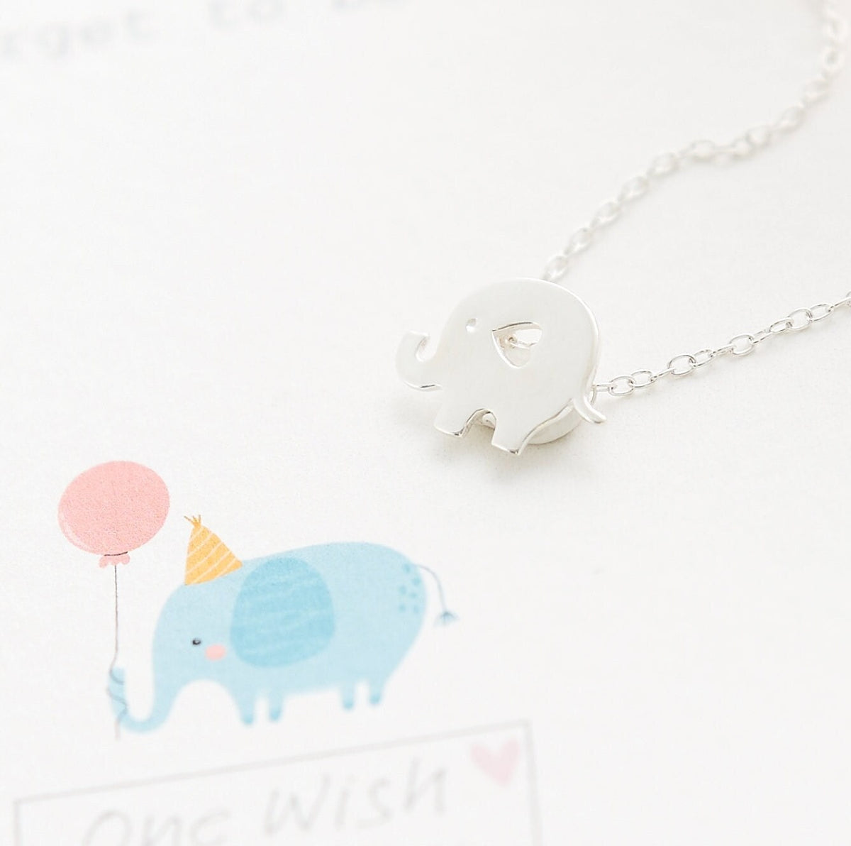 silver elephant sterling silver necklace on elephant gift card