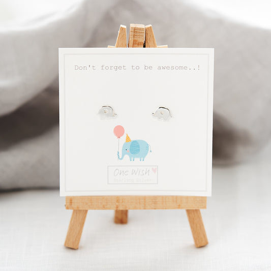 A sterling silver elephant stud earring on a bespoke gift card with a quote and a balloon illustration.